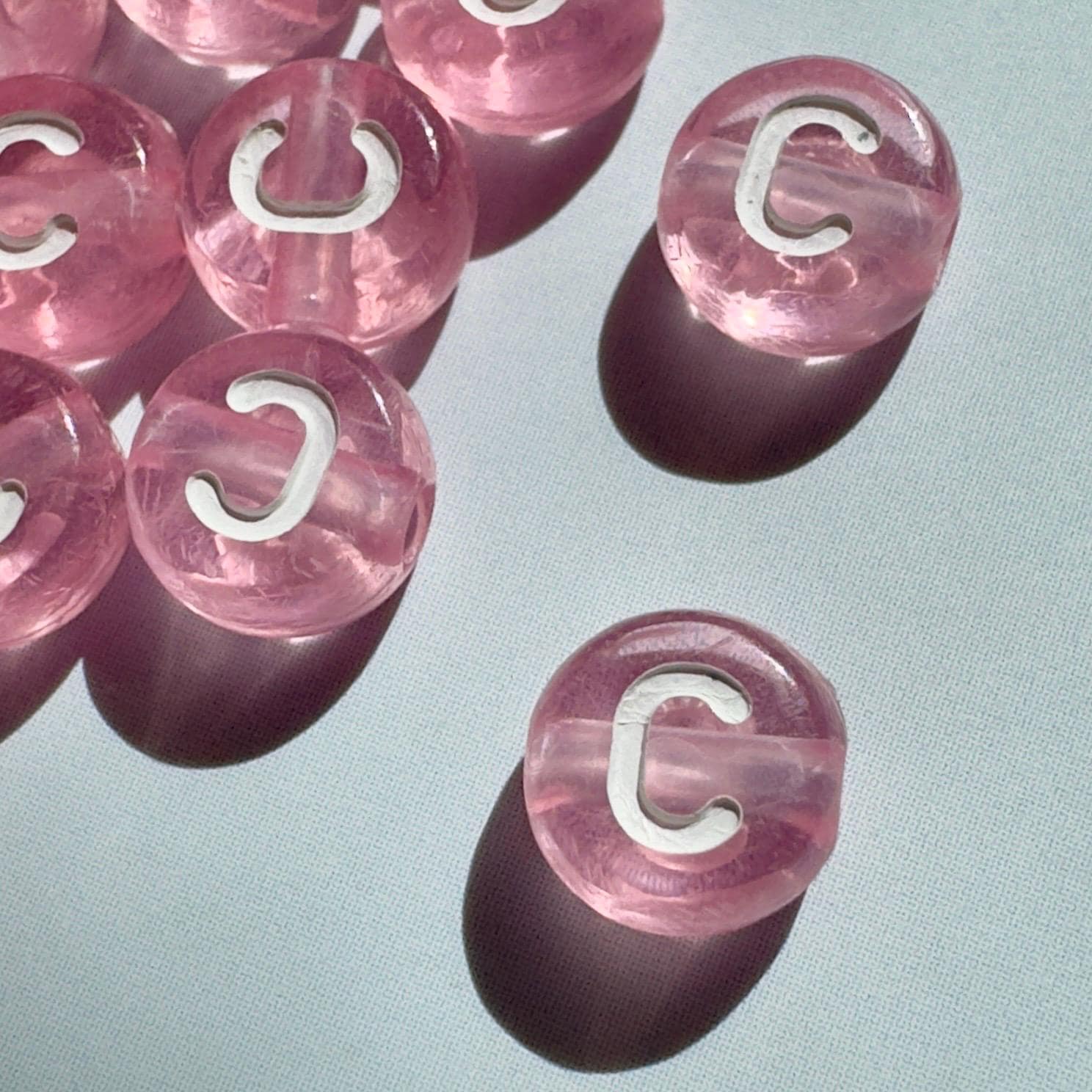 Translucent Pink Letter Beads: 7x4mm Alphabet Beads A-Z, 10 of Each Letter