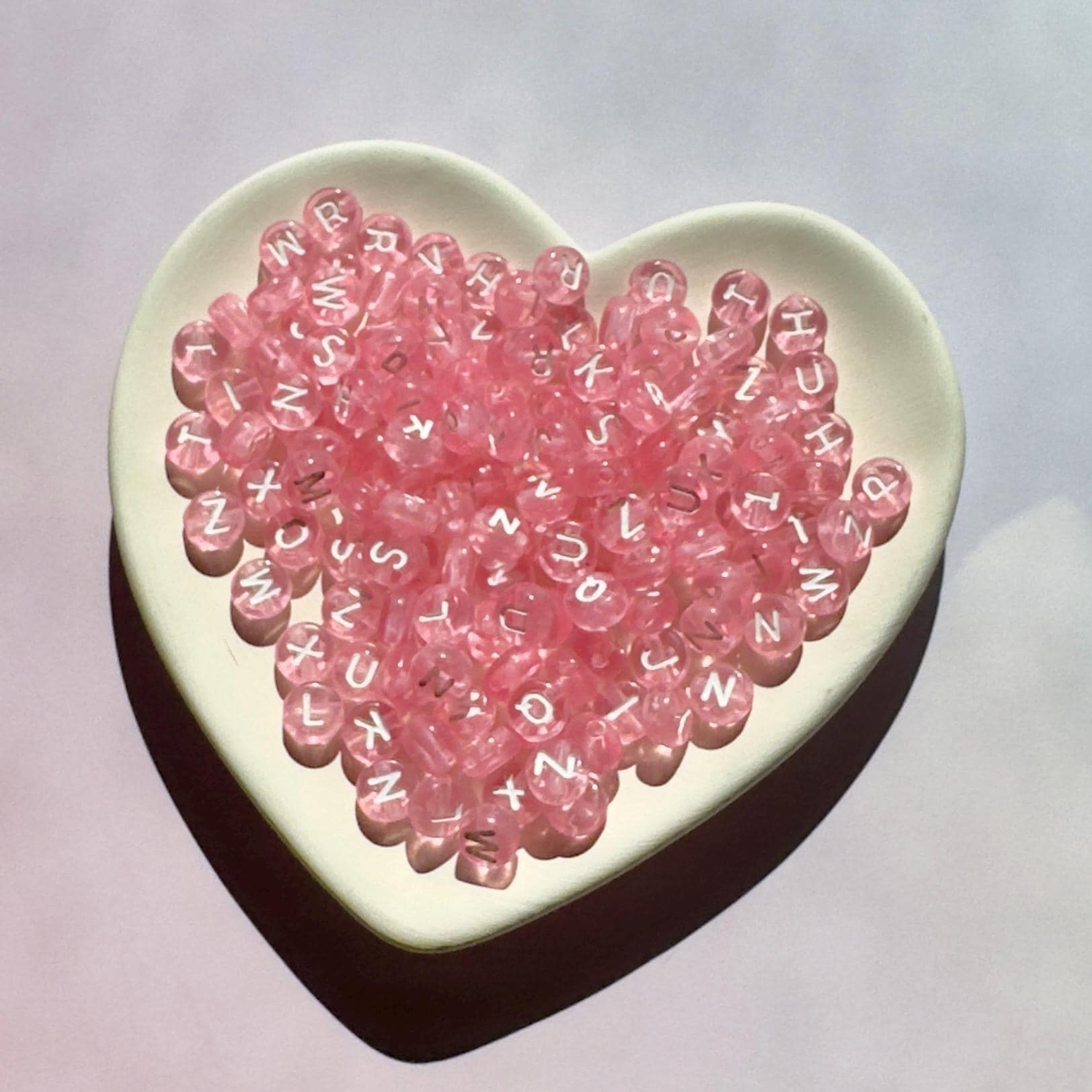 Translucent Pink Letter Beads: 7x4mm Alphabet Beads A-Z, 10 of Each Letter